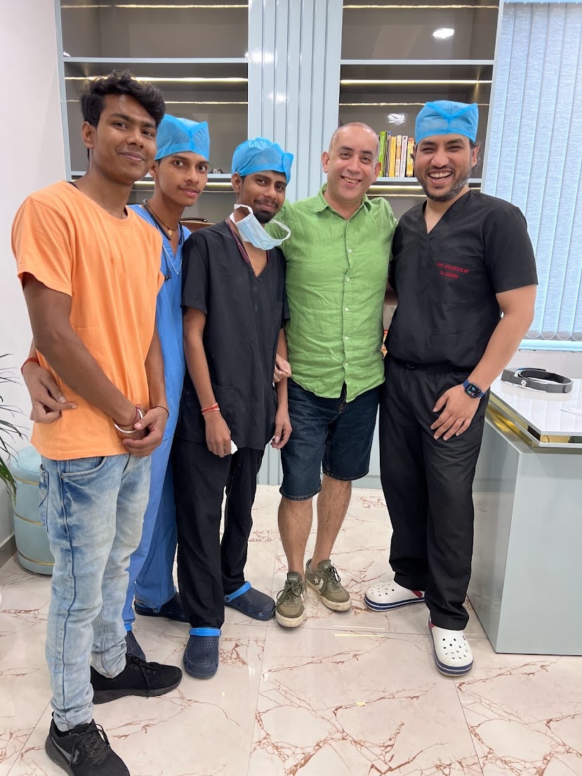 Hair transplant patient from Australia with Dr Gaurav Solanki and the surgical team at Cult Aesthetics, best hair transplant clinic in Gurgaon India